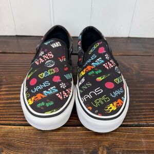 Vans Classic Slip-On “Disruptive” – Black Multi Logo – Women’s 8.5 / Men’s 7